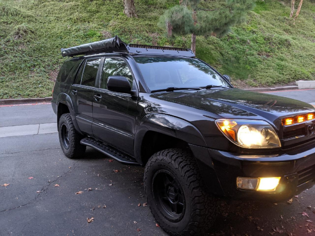 Cali Raised LED 2003-2009 TOYOTA 4RUNNER STEP EDITION BOLT ON ROCK SLIDERS driver