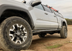 Cali Raised LED 2005-2023 TOYOTA TACOMA STEP EDITION ROCK SLIDERS front view