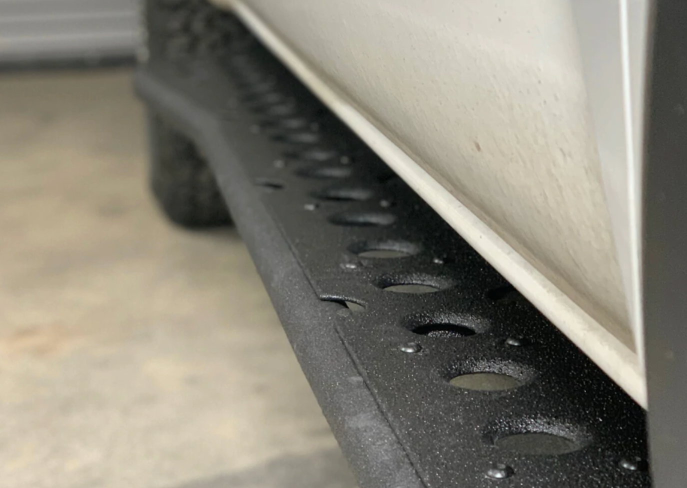 Cali Raised LED 2005-2023 TOYOTA TACOMA STEP EDITION ROCK SLIDERS close up