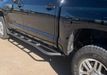 Cali Raised LED 2014-2021 TOYOTA TUNDRA STEP EDITION ROCK SLIDERS drive side