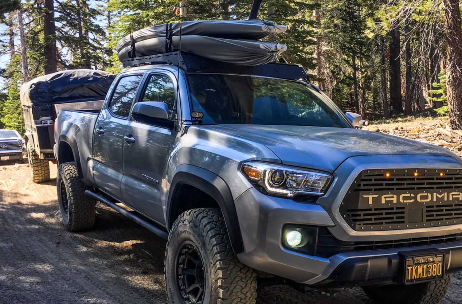 Cali Raised LED 2005-2023 TOYOTA TACOMA TRAIL EDITION ROCK SLIDERS passenger side