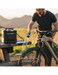 RinseKit Cube portable shower washing mountain bike after outdoor ride