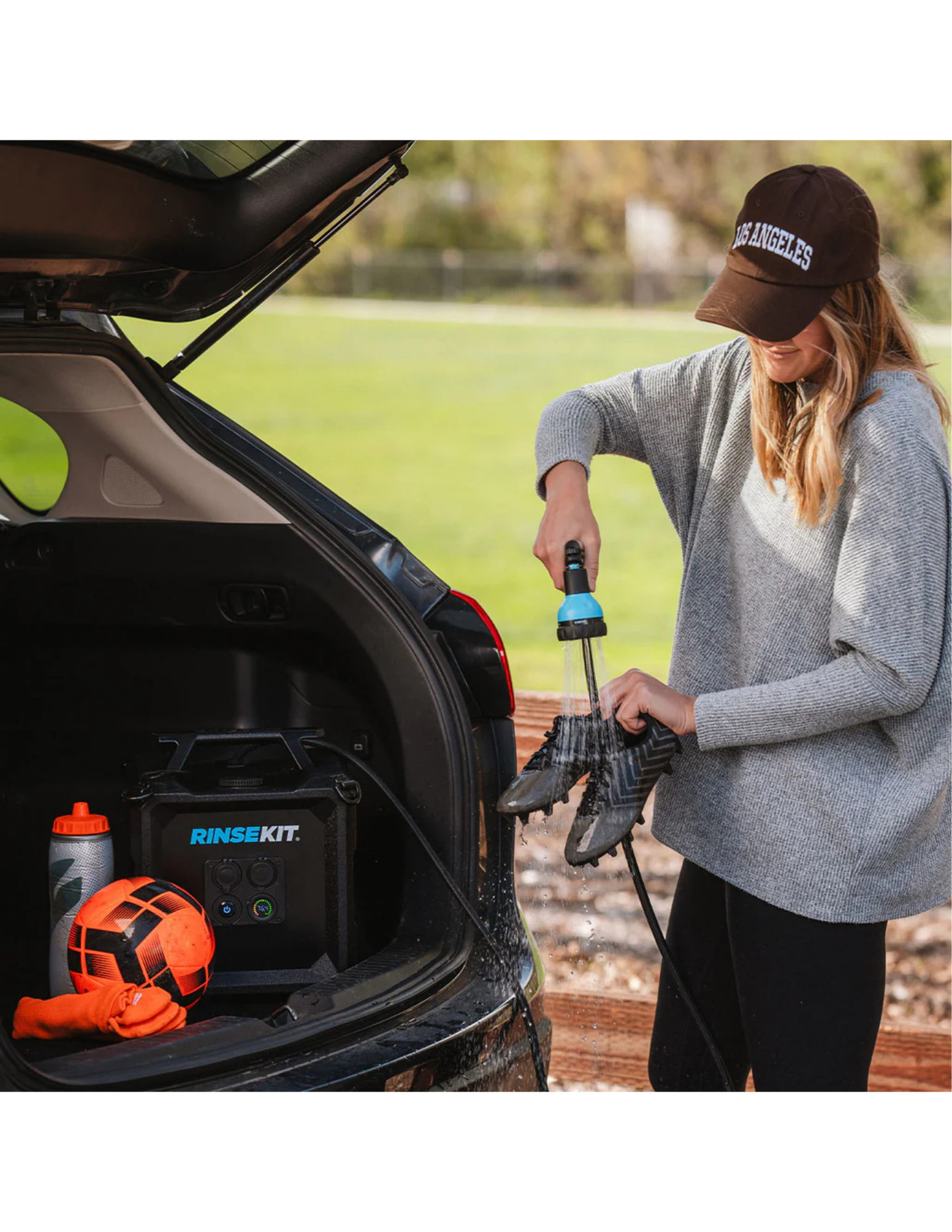 RinseKit Cube portable shower cleaning athletic shoe from car trunk