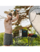 RinseKit Cube portable camping shower used for outdoor shower beside tent