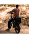 RinseKit Cube mounted on electric bike for portable water access on trails