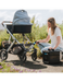 RinseKit Cube portable shower rinsing stroller wheels after outdoor walk