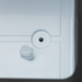 close up of drain plug on fridge