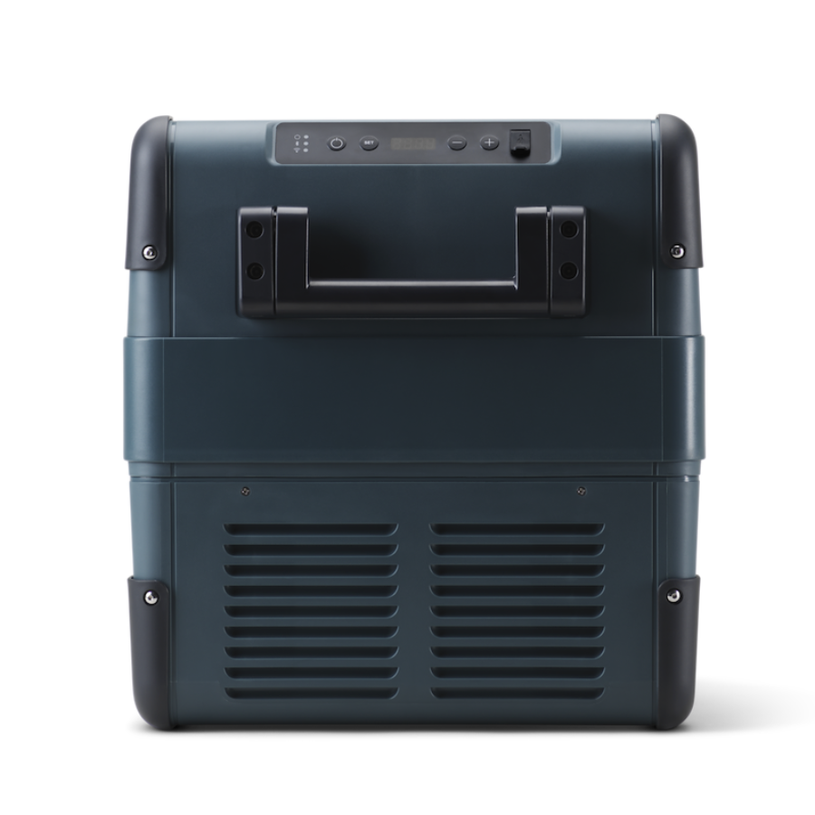 Back view of a dark blue suitcase with handle and ventilation slots on a white background
