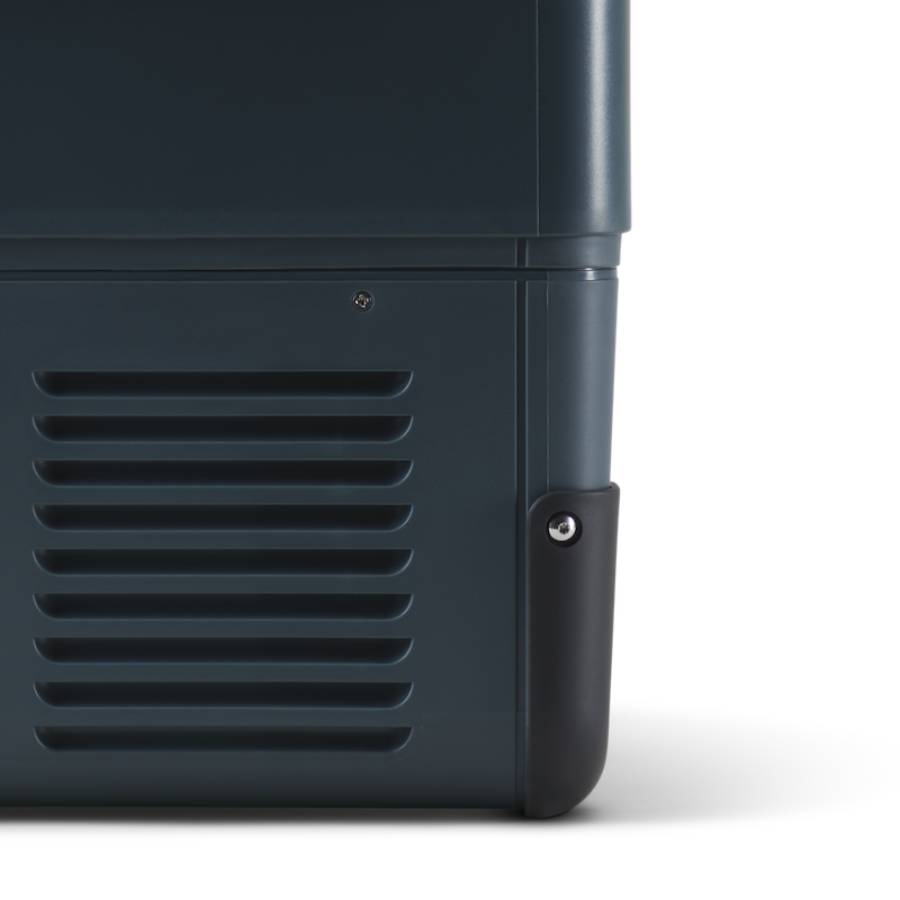 Close-up of a dark blue suitcase with a vent and handle on a white background