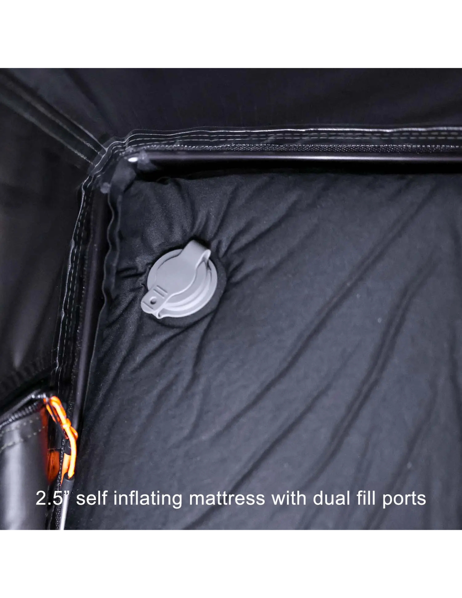 Close-up of a self-inflating mattress with dual fill ports.