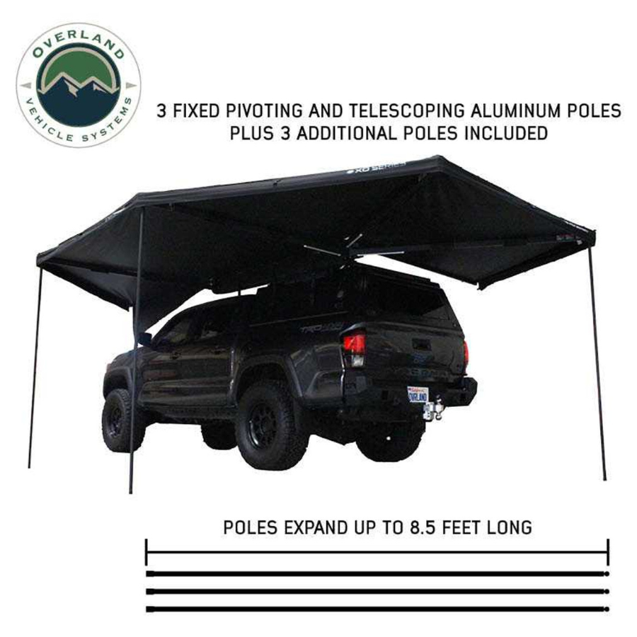 OVS XD Nomadic 270 Degree Awning W/Lights & Black Out - Black Body, Grey Trim & Black Travel Cover with telescoping poles deployed 