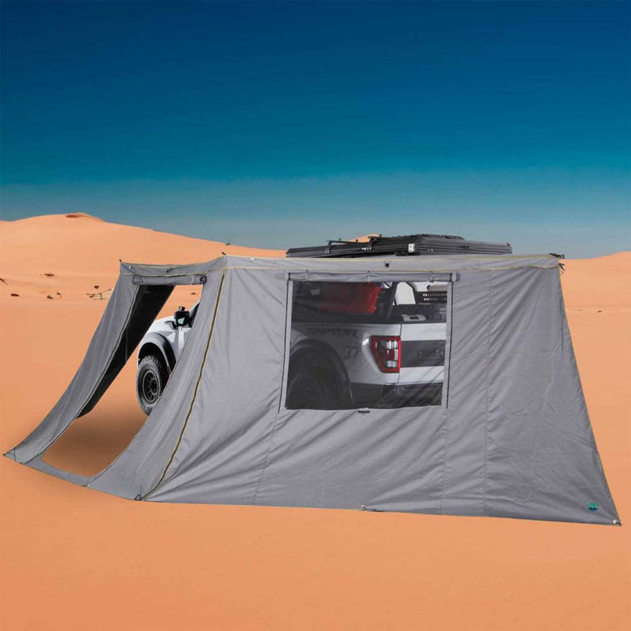 OVS HD Nomadic 180 Degree Awning Side Wall with Window - Dark Gray With Storage Bag outdoors