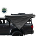 OVS HD Nomadic 270 Degree Awning - Driver Side - Dark Gray Awning With Black Cover folded closed 