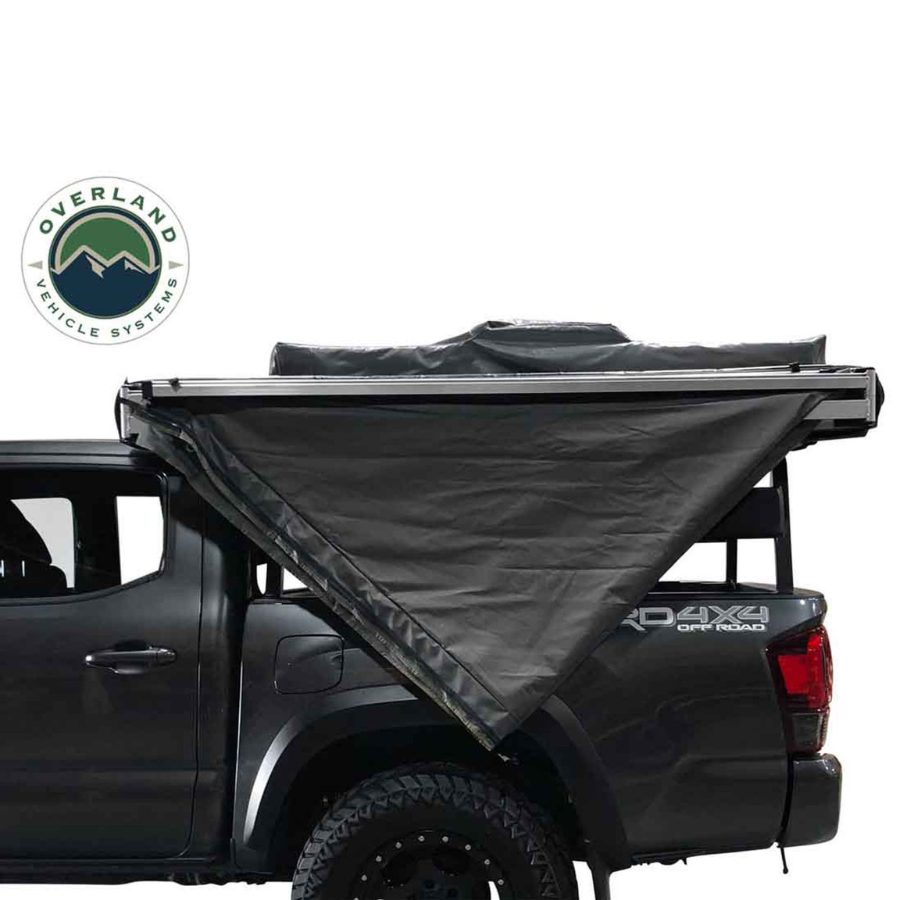 OVS HD Nomadic 270 Degree Awning - Driver Side - Dark Gray Awning With Black Cover folded closed 