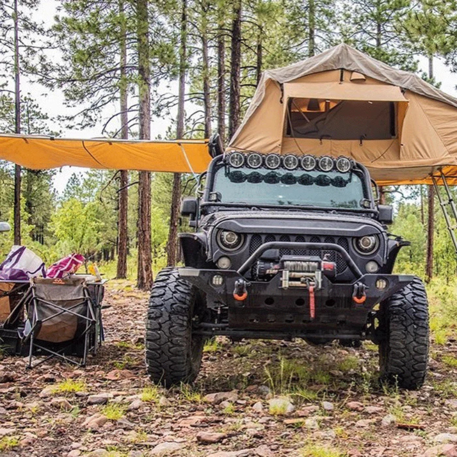 Tuff Stuff Overland Truck or Car Awning, 6.5x8 Feet, Poly-Cotton Ripstop Fabric, Tan front view with roof top tent