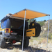 Tuff Stuff Overland Truck or Car Awning, 4.5x6 Feet, Poly-Cotton Ripstop Fabric, Tan rear left view