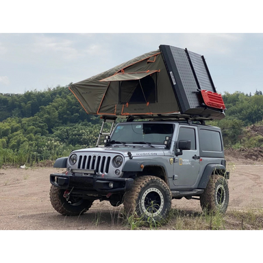 TUFF STUFF OVERLAND  STEALTH HARDSHELL ROOFTOP TENT, ALUMINUM, 3 PERSON, BLACK front corner view on silver jeep