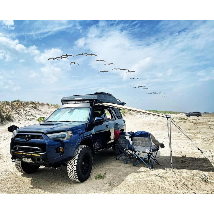 TUFF STUFF OVERLAND  STEALTH HARDSHELL ROOFTOP TENT, ALUMINUM, 3 PERSON, BLACK closed on 4runner with awning out