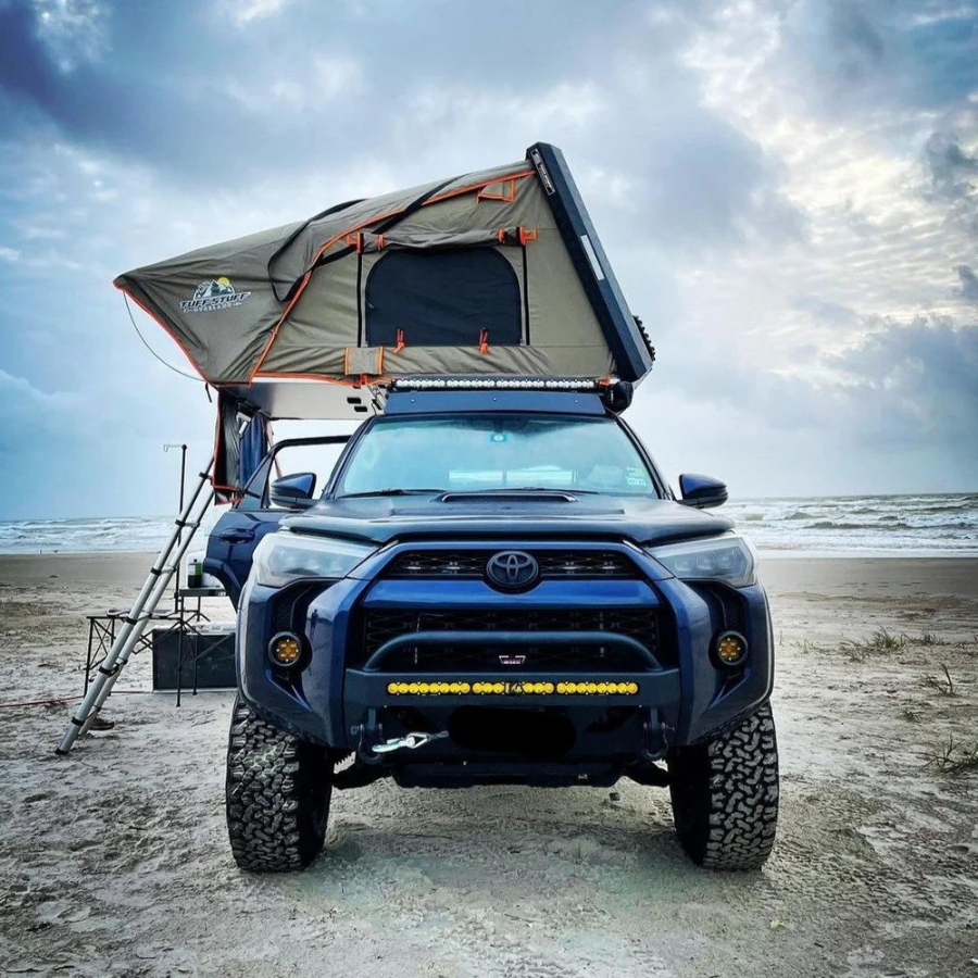 TUFF STUFF OVERLAND  STEALTH HARDSHELL ROOFTOP TENT, ALUMINUM, 3 PERSON, BLACK side view on 4runner