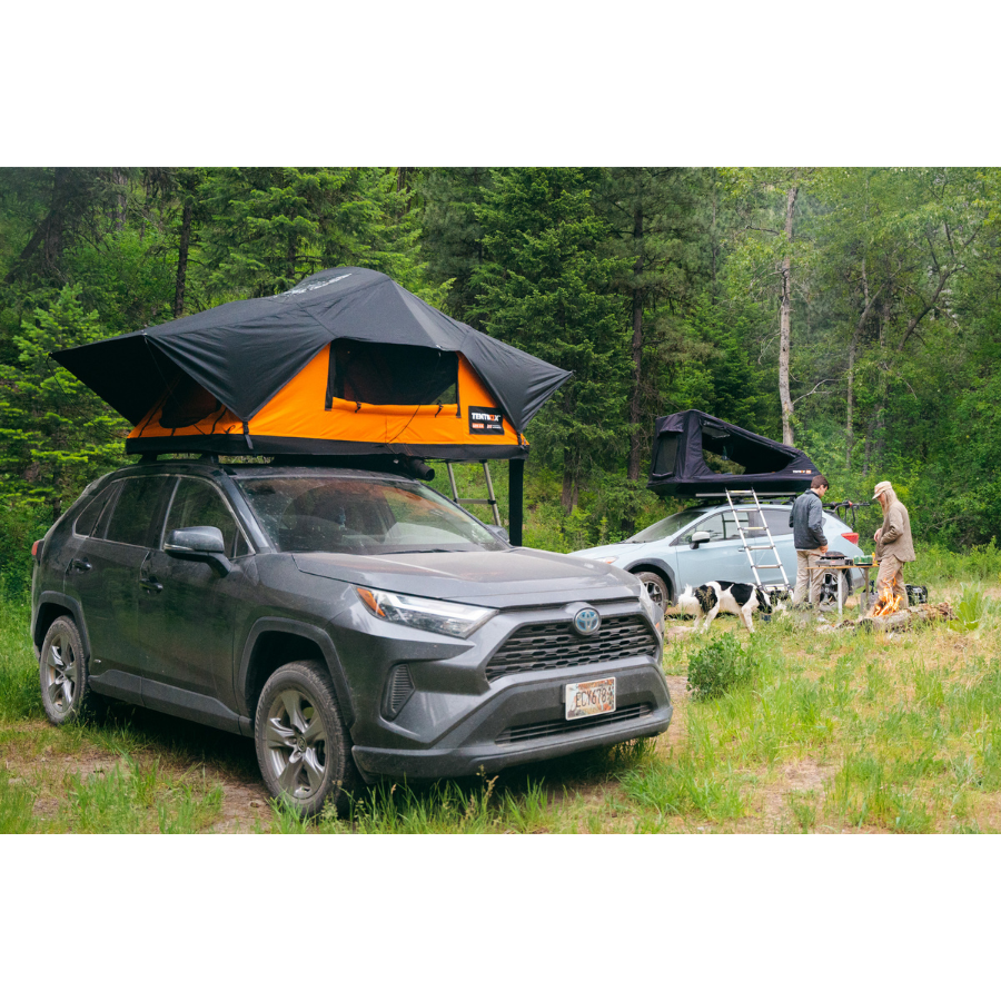 TentBox Lite 2.0 Rooftop Tent in front of campfire - sunset color 