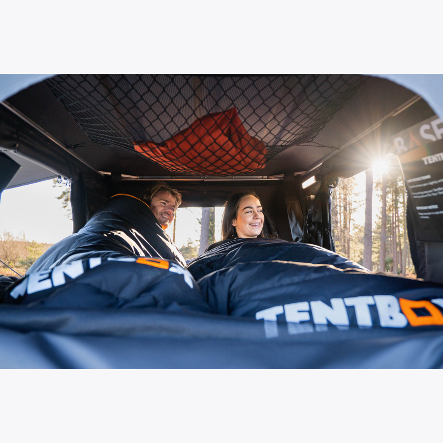 TentBox Classic 2.0 Rooftop Tent interior view with 2 people inside