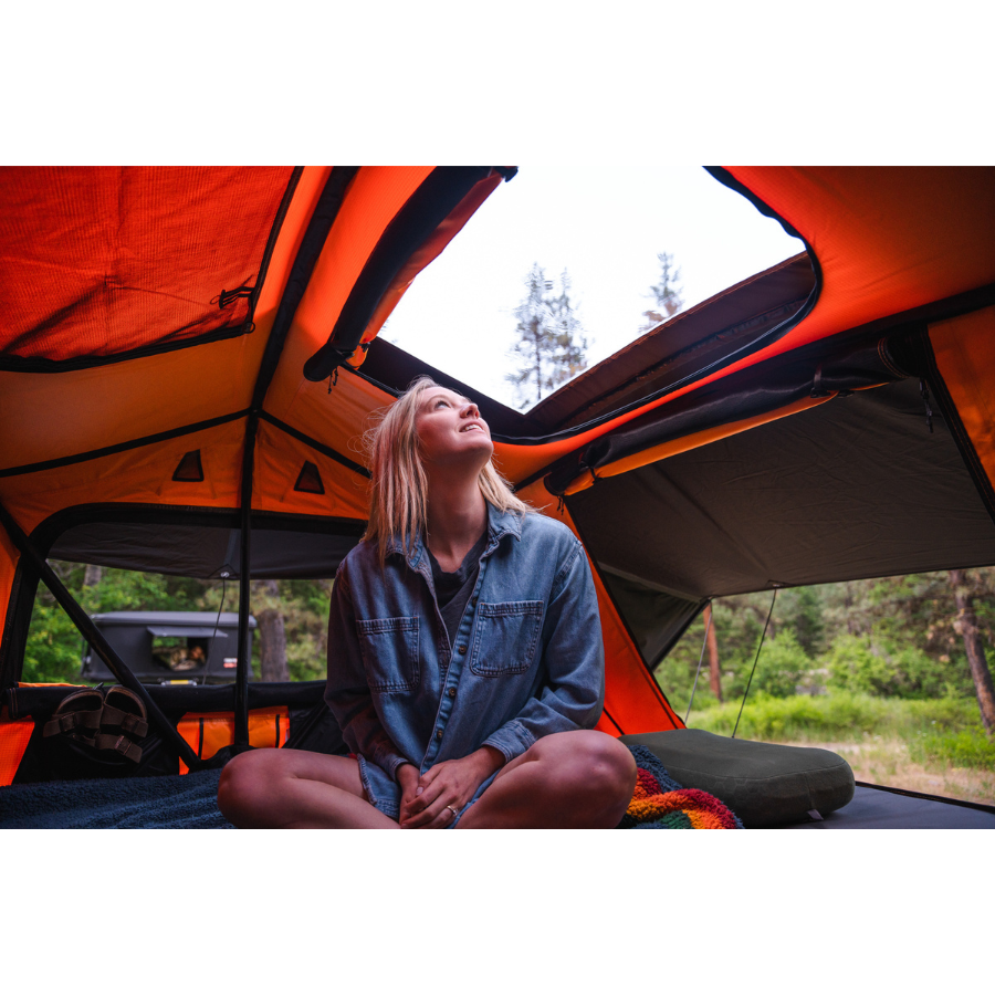 TentBox Lite XL interior with person looking through sky window